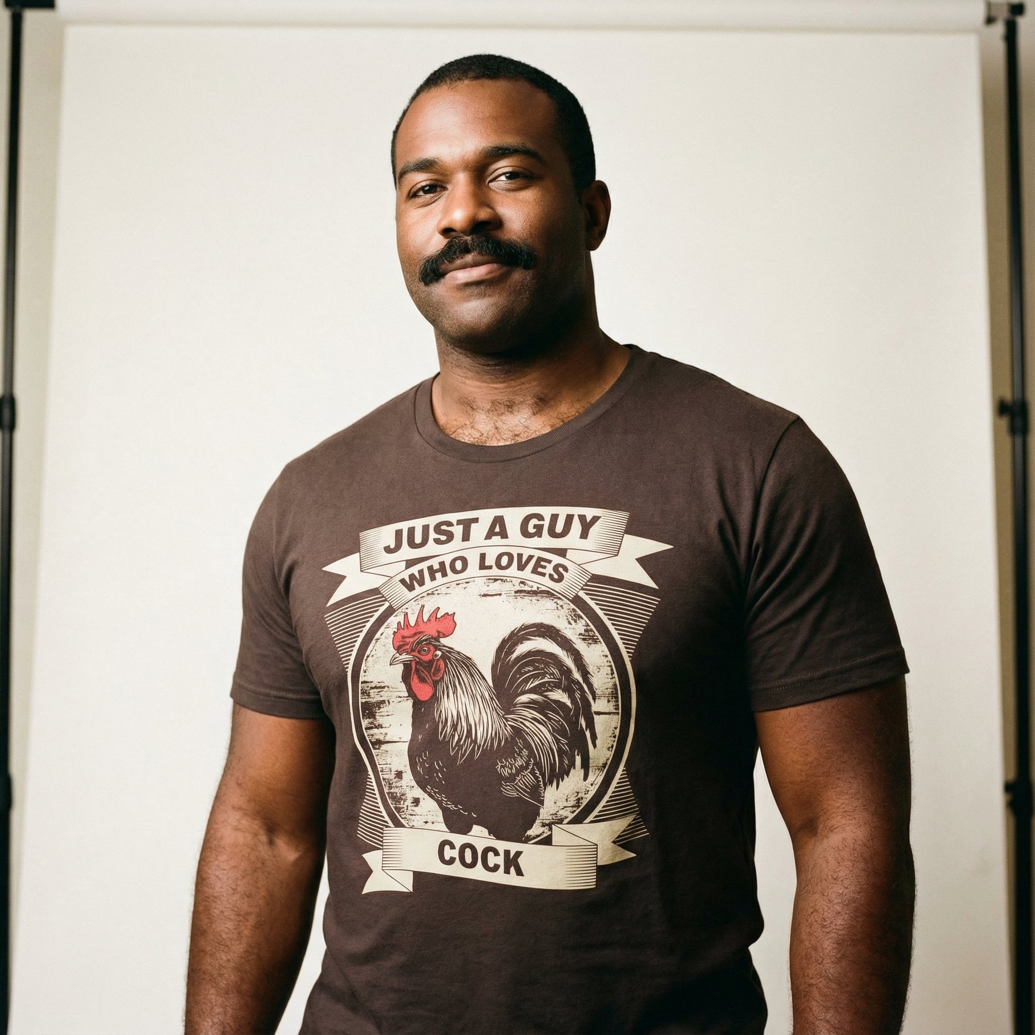 Just a Guy Who Loves Cock T-Shirt #color_Brown