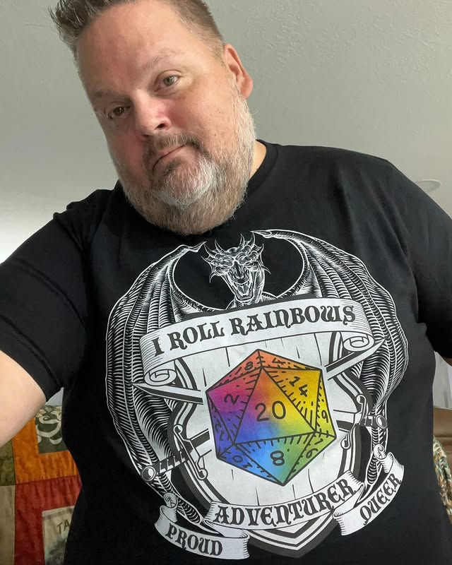 walkingwithjulius wearing the "I Roll Rainbows" T-Shirt