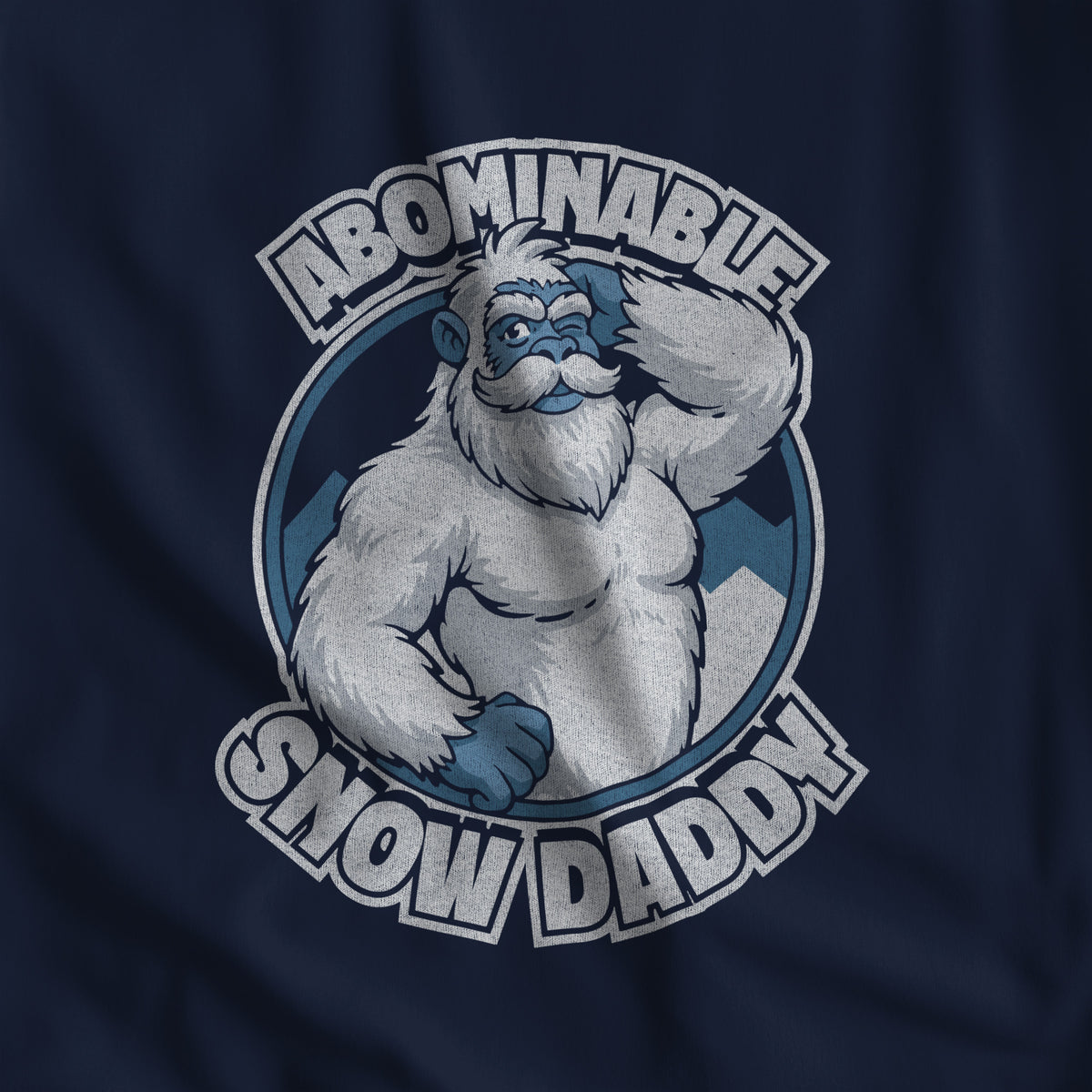 Close-up of the Abominable Snow Daddy yeti print on navy fabric #color_Navy