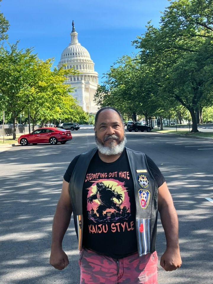 bearbeast269 wearing the "Stomping Out Hate Kaiju Style" T-Shirt