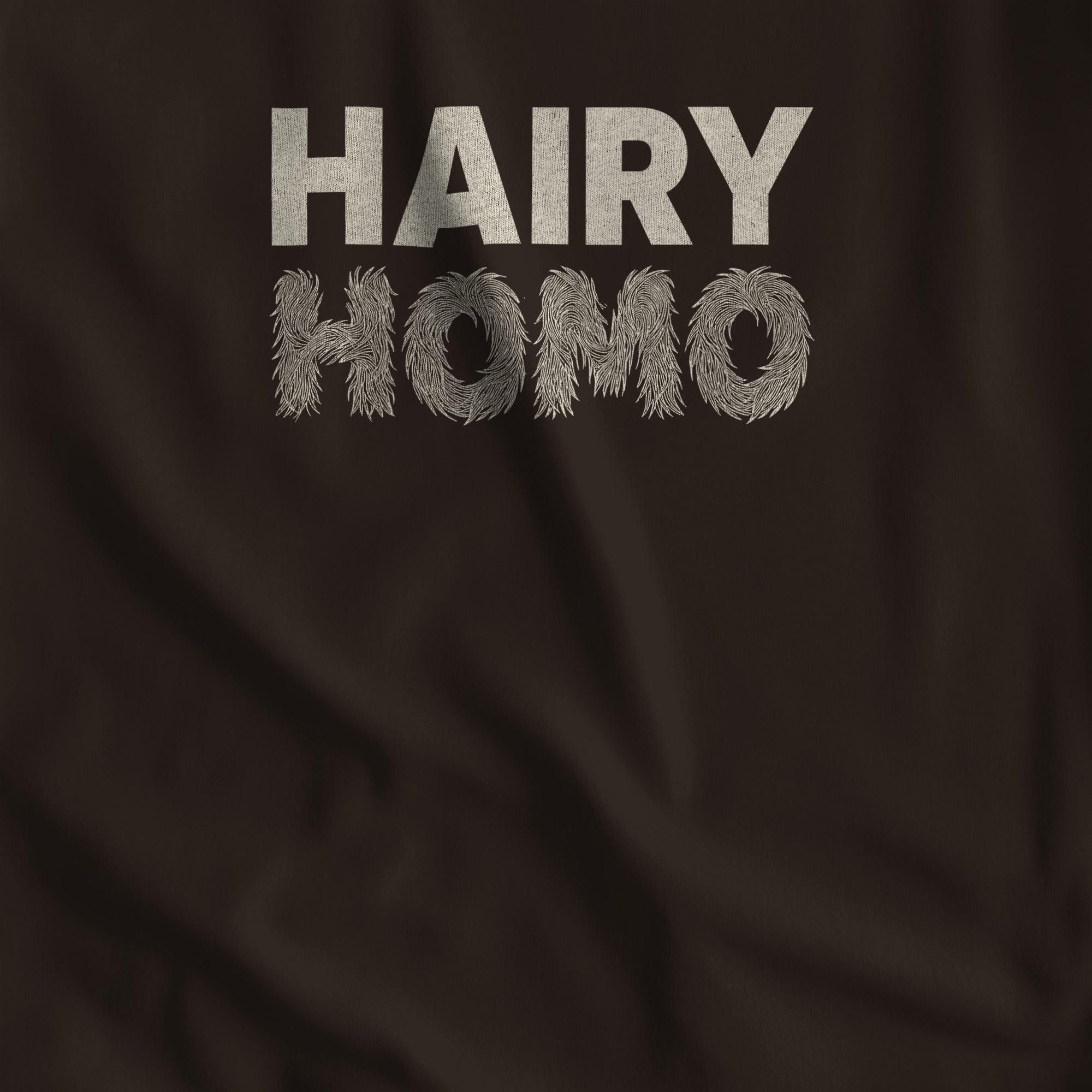 Close-up of the Hairy Homo furry HOMO lettering print on brown #color_Brown