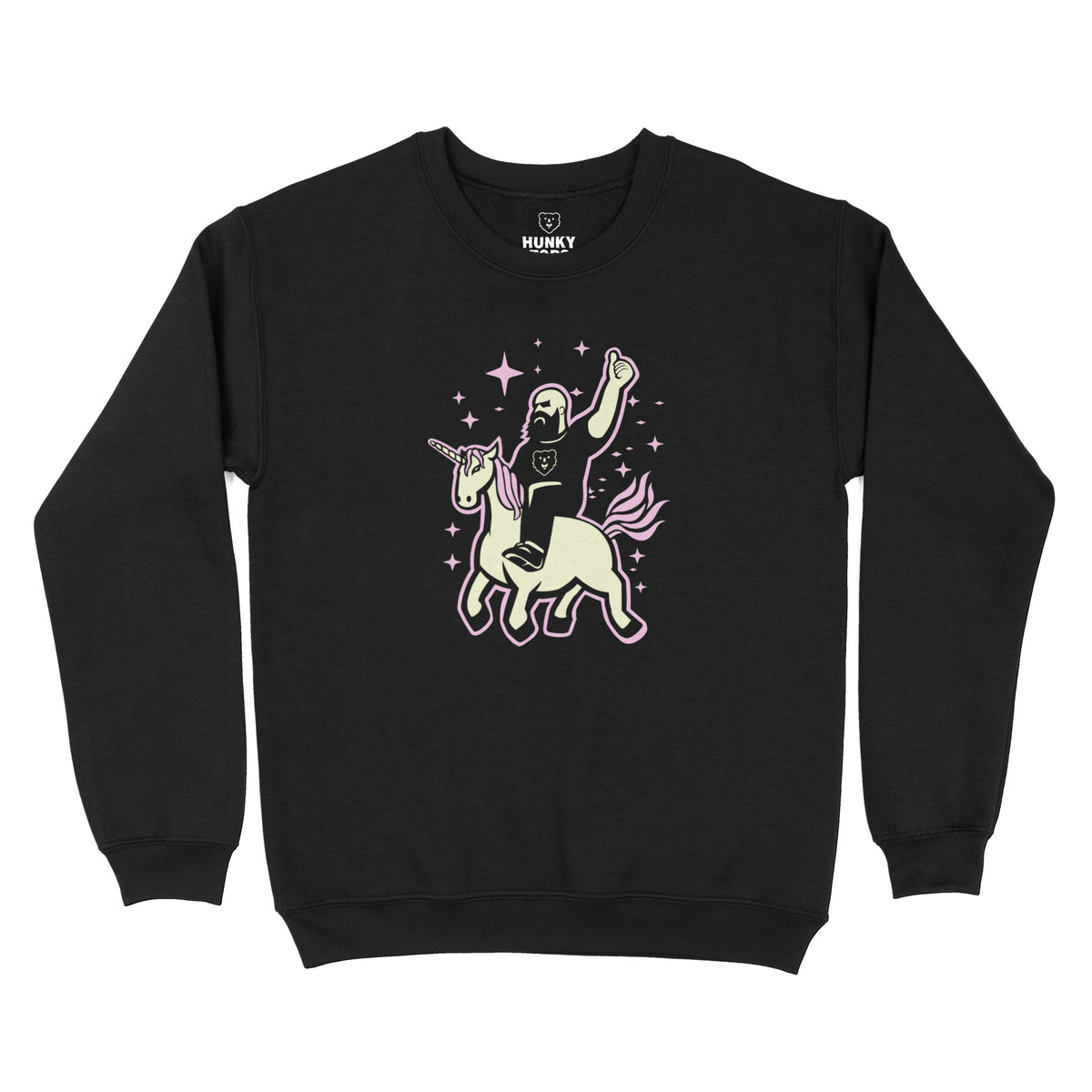 The Mythic Unicorn Wrangler: a bearded bear riding a pastel unicorn through stars on a black crewneck sweatshirt, flat lay #color_Black