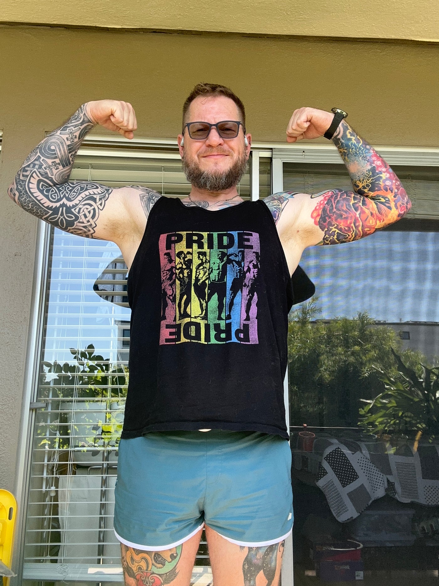 gymbearfitness wearing the Pride Power Tank Top