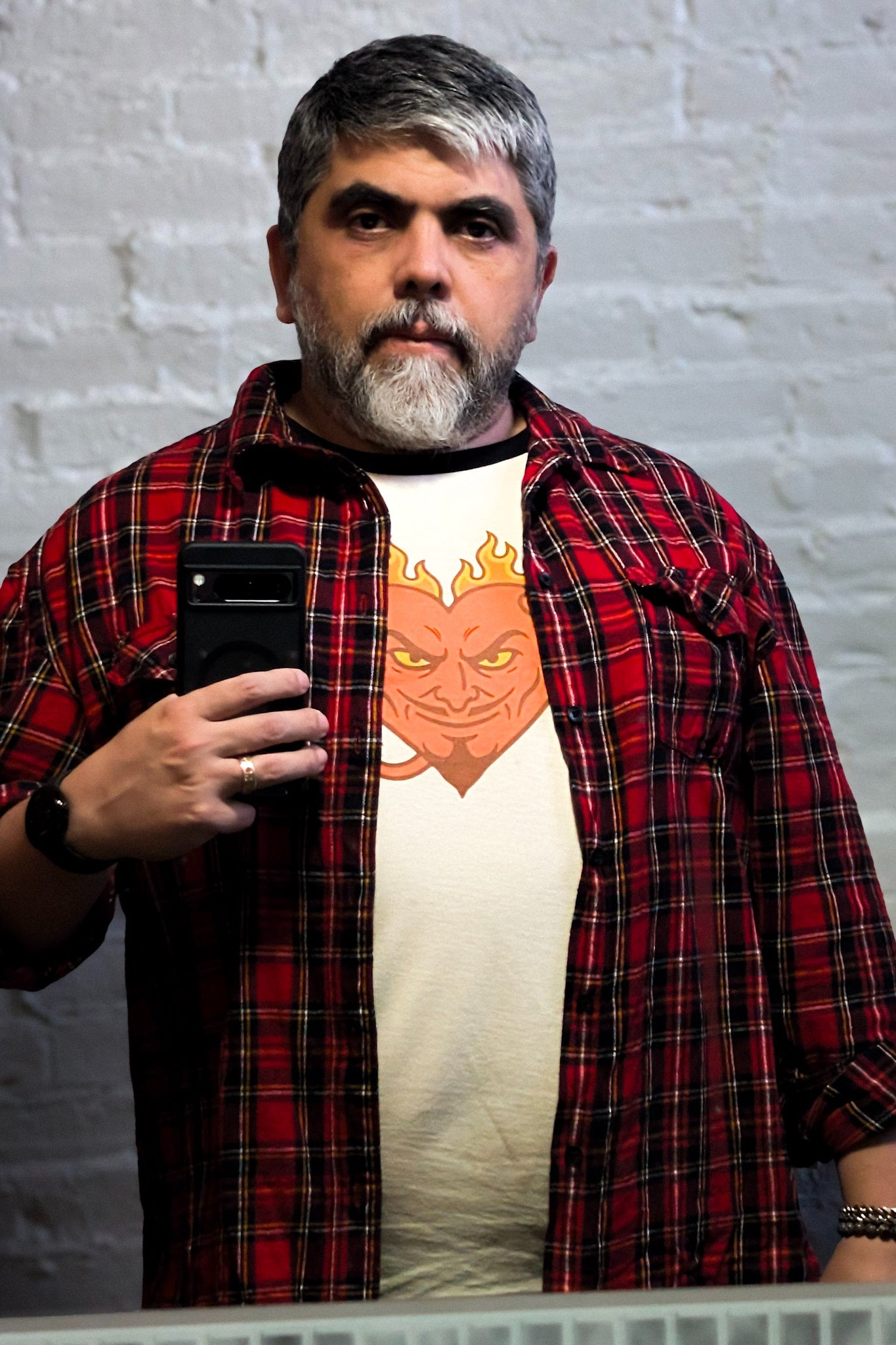 borghal wearing the Hellfire Zaddy Ringer T-Shirt