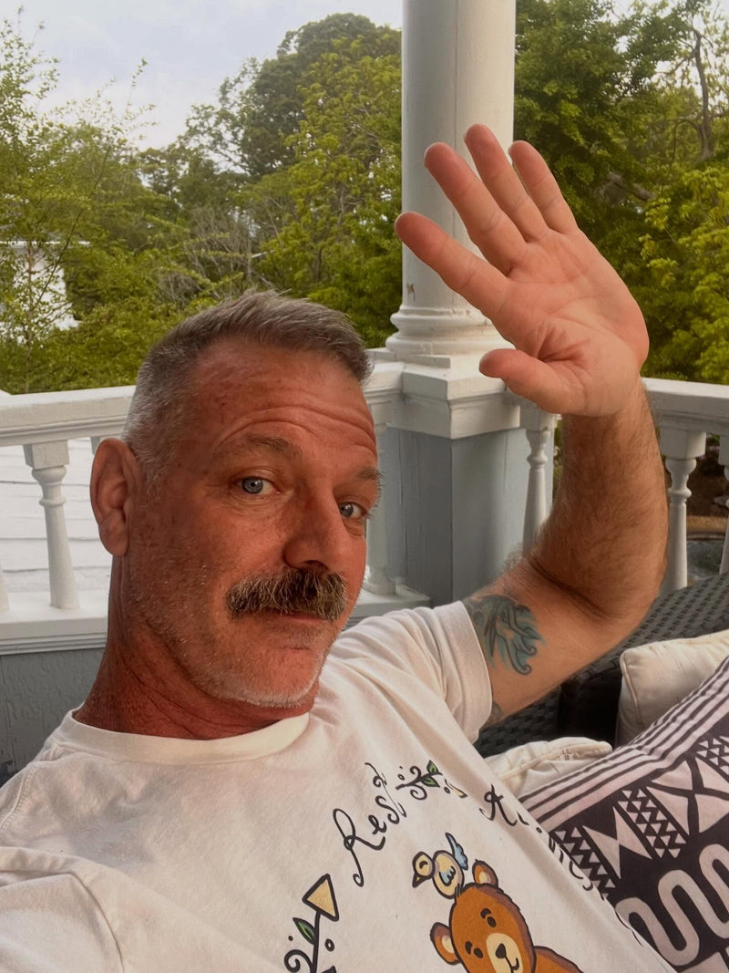dadnxt wearing Hunky Tops