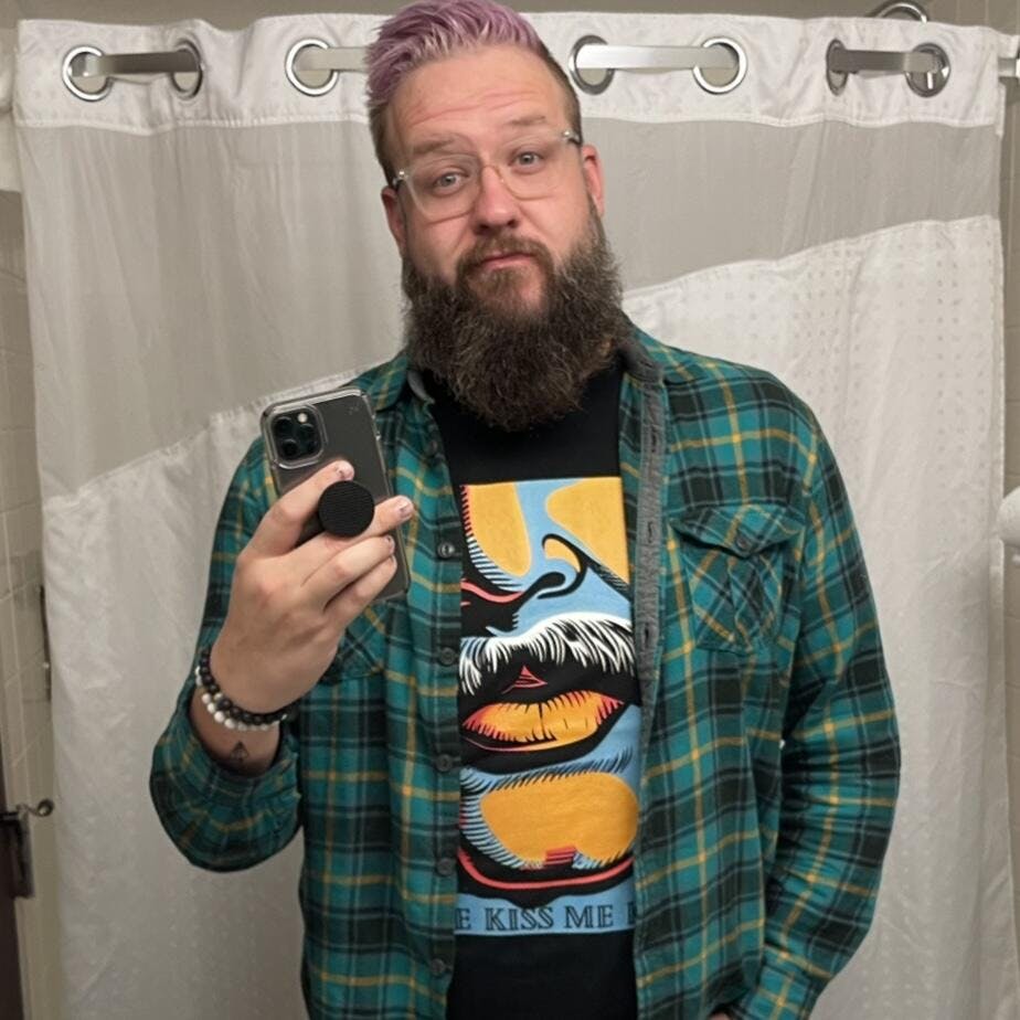 ndguybrarian wearing the Kiss Me Gay T-Shirt