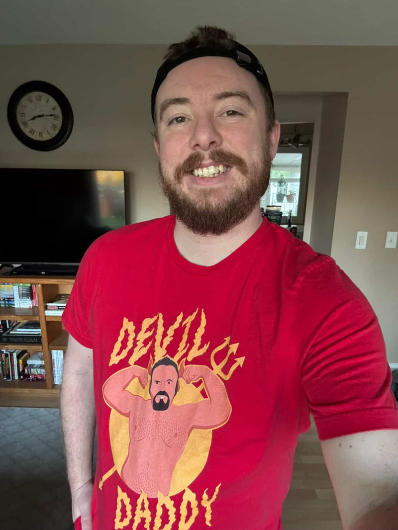 derektqueen wearing Hunky Tops