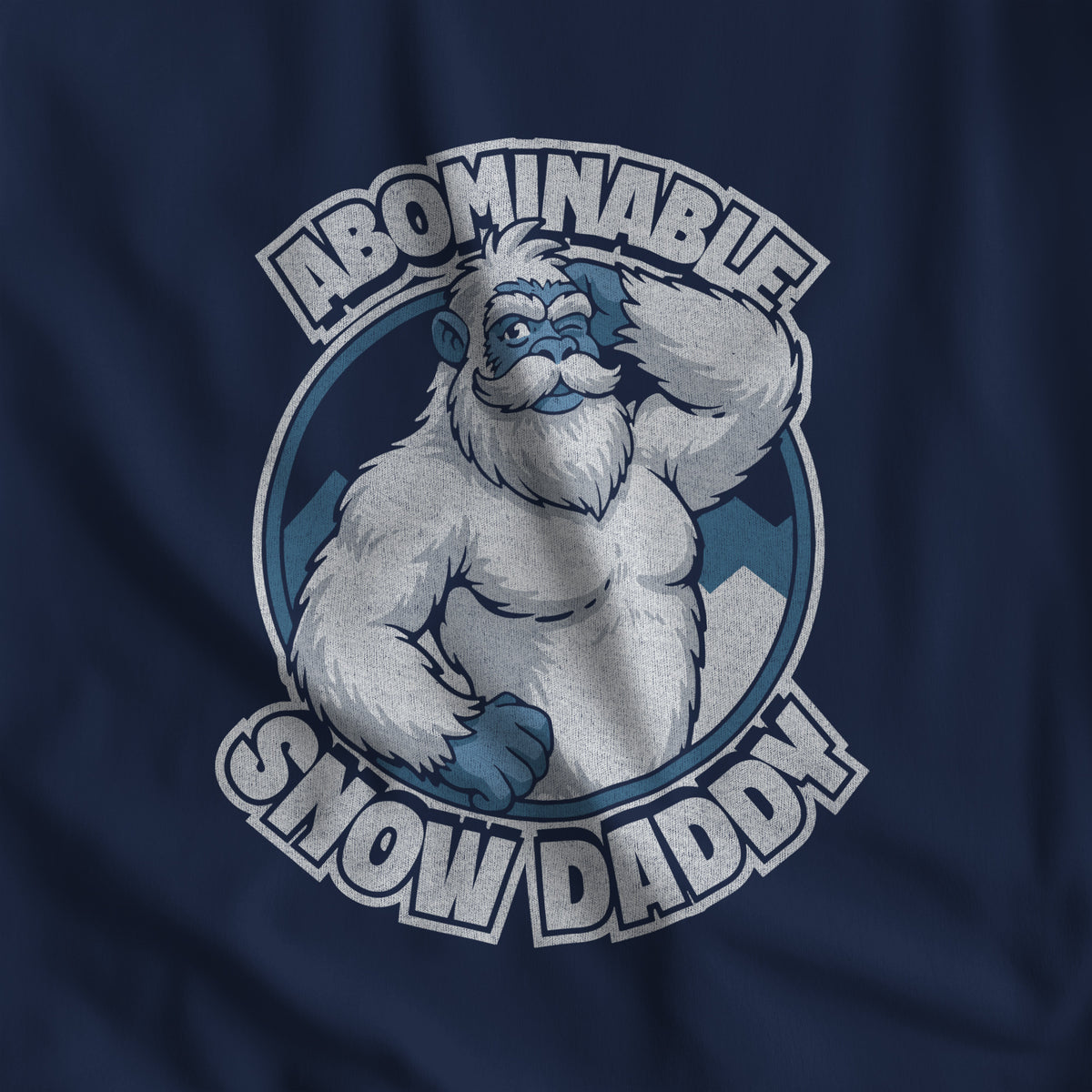 Close-up of the Abominable Snow Daddy yeti print on navy fabric #color_Navy