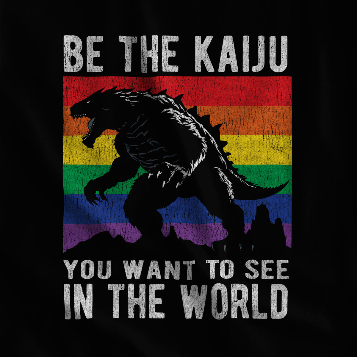 Close-up of the "Be the Kaiju" kaiju and rainbow flag print on black fabric #color_Black