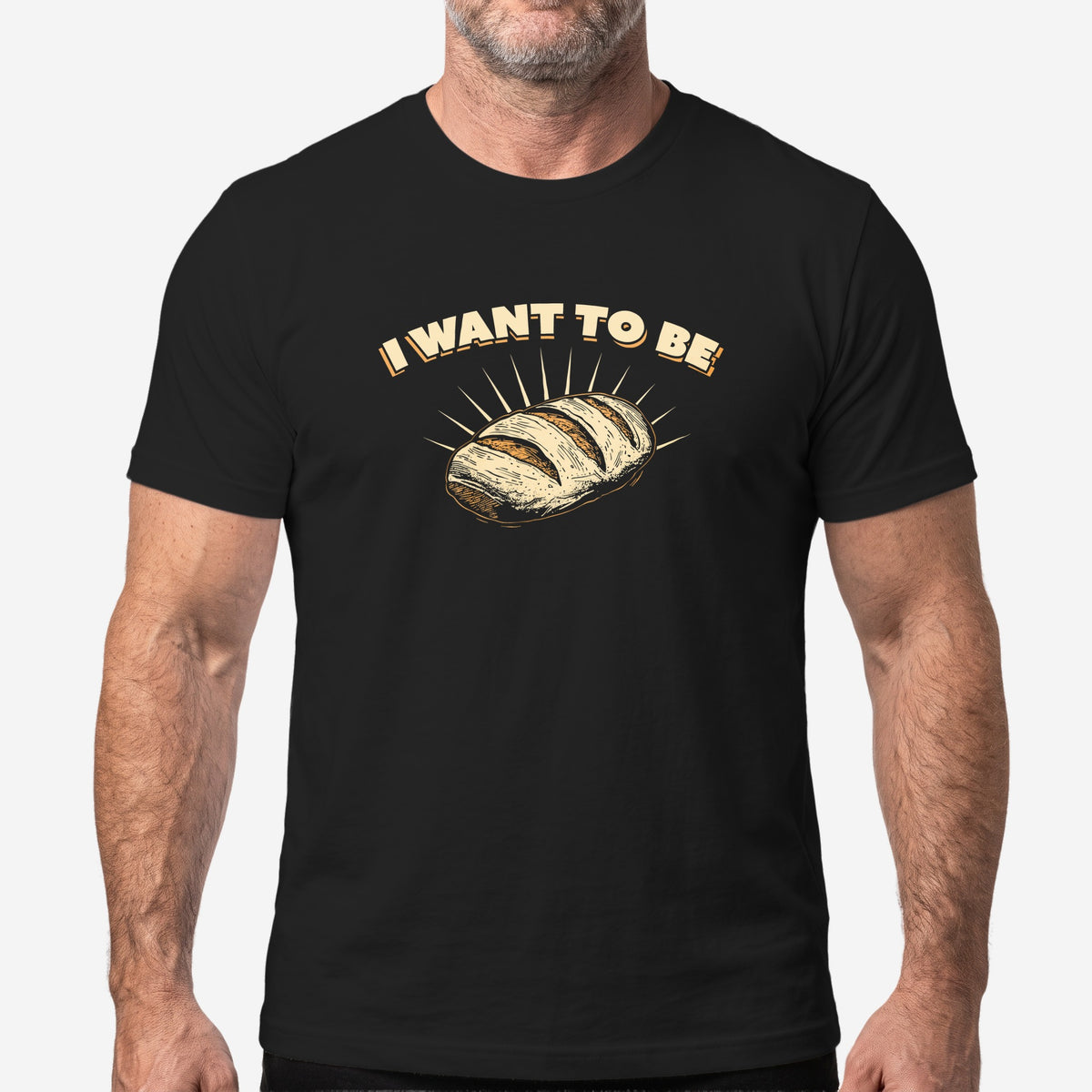 I WANT TO BE BREAD graphic on a black t-shirt, worn on a model #color_Black