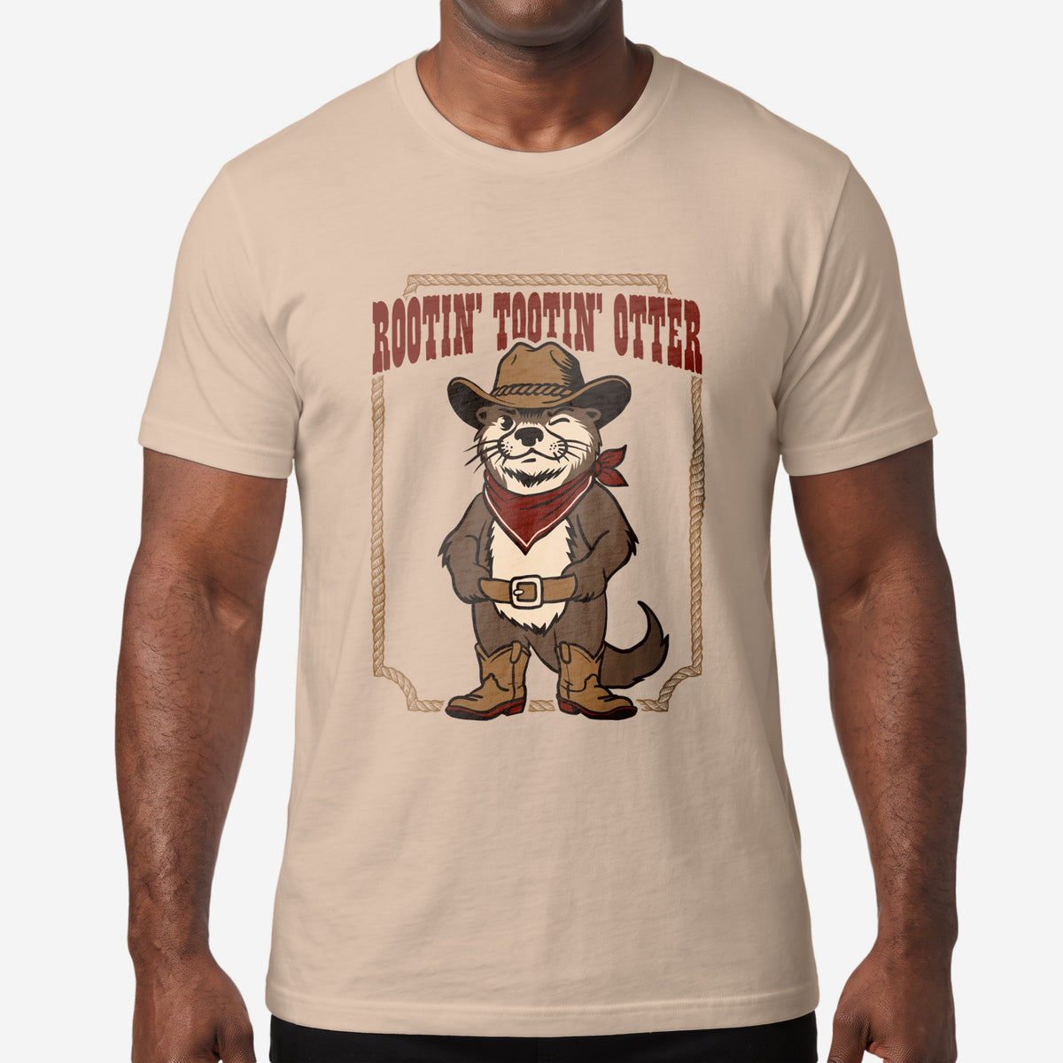 Man wearing the Rootin' Tootin' Otter tan t-shirt #color_Tan