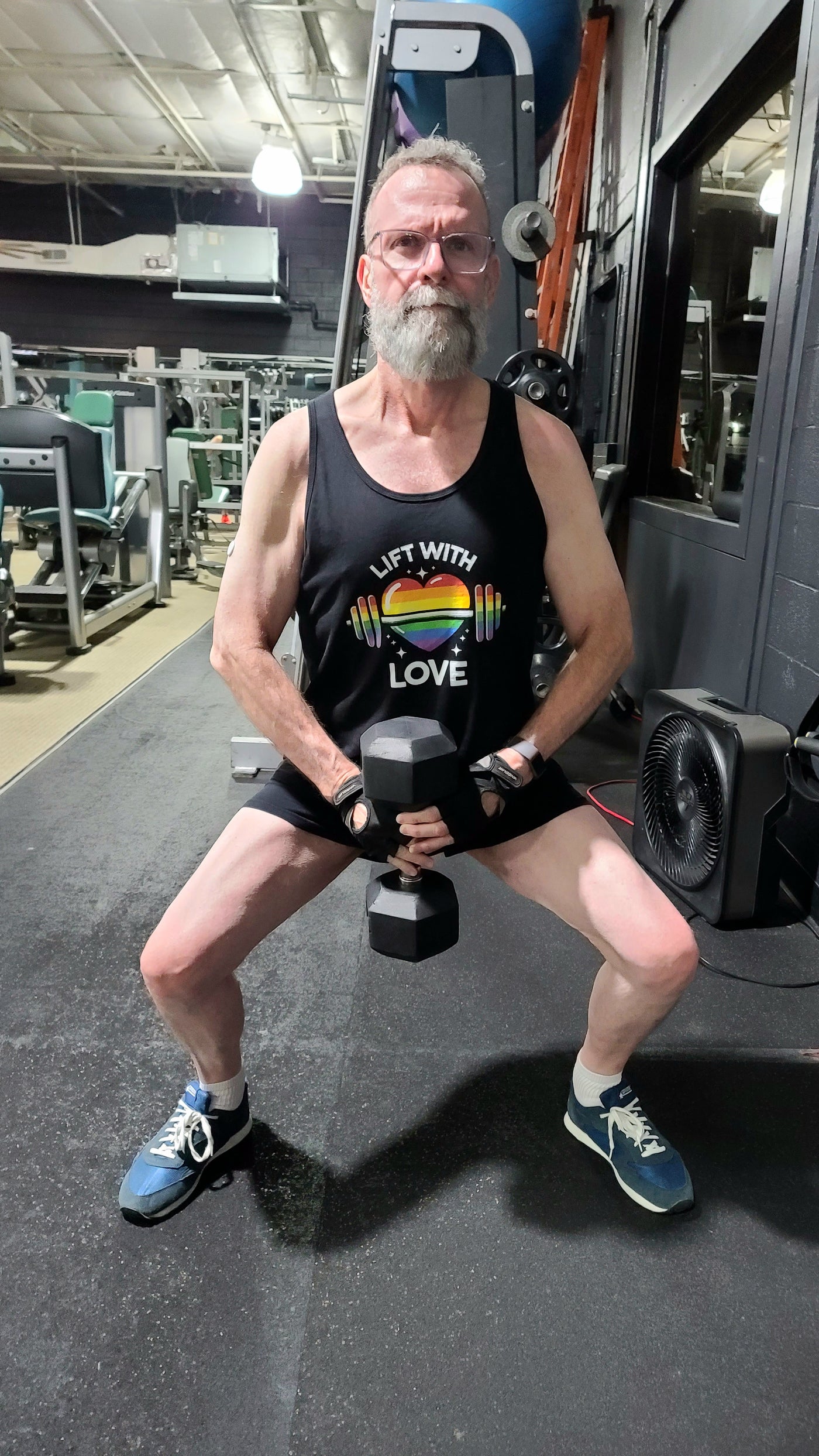druidguyatl wearing the "Lift With Love" Pride Tank Top