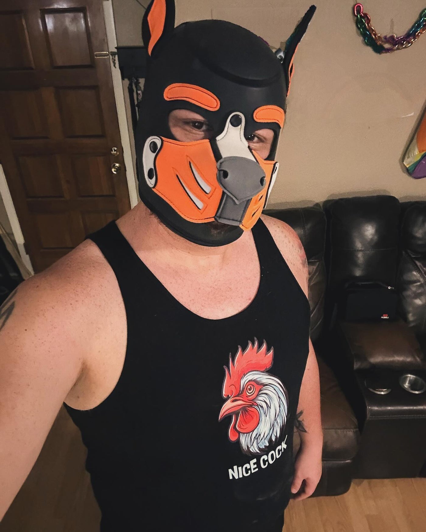 xanderthealphapup wearing the "Nice Cock" Rooster Tank Top