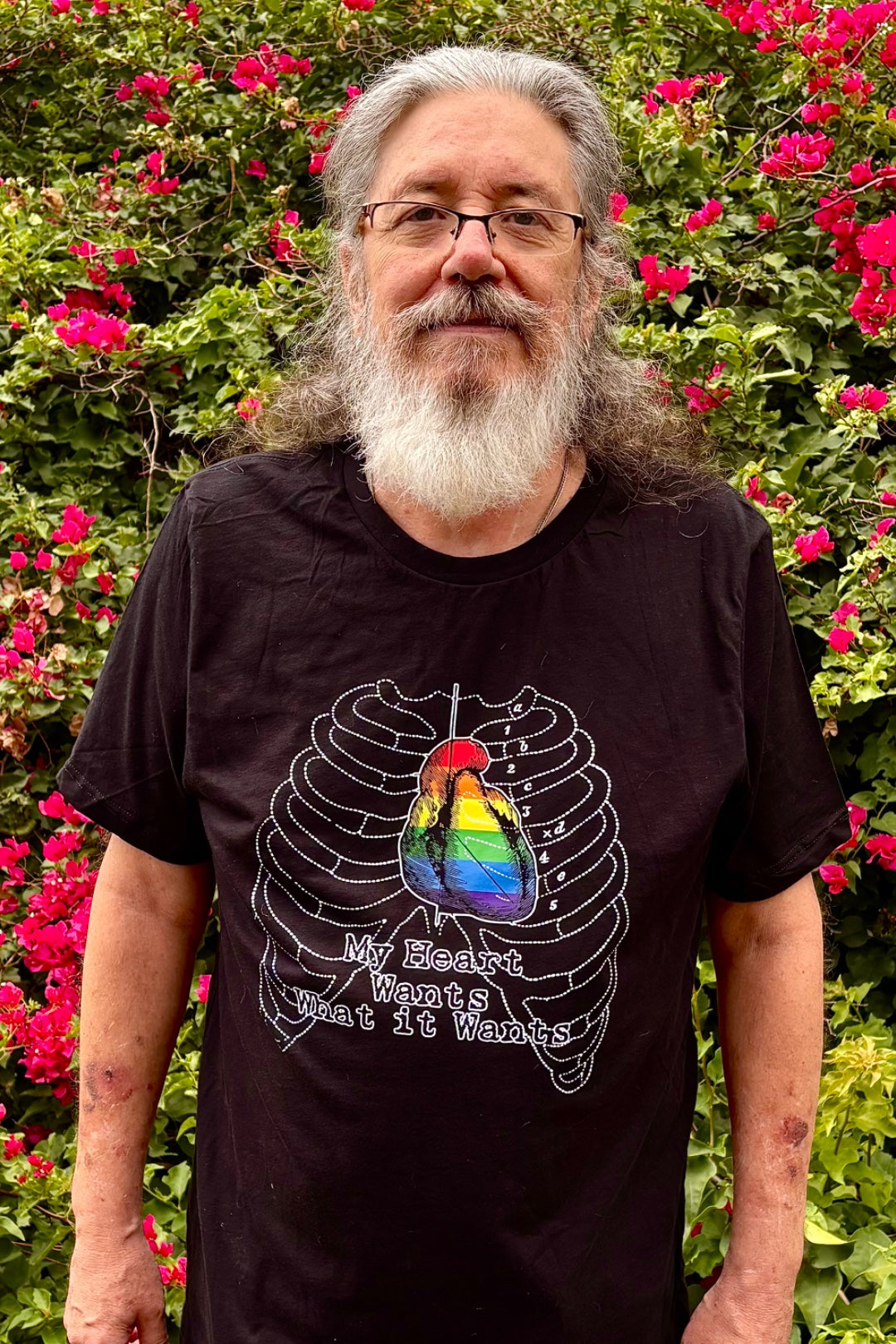 Daniel wearing the MY HEART WANTS Pride T-Shirt