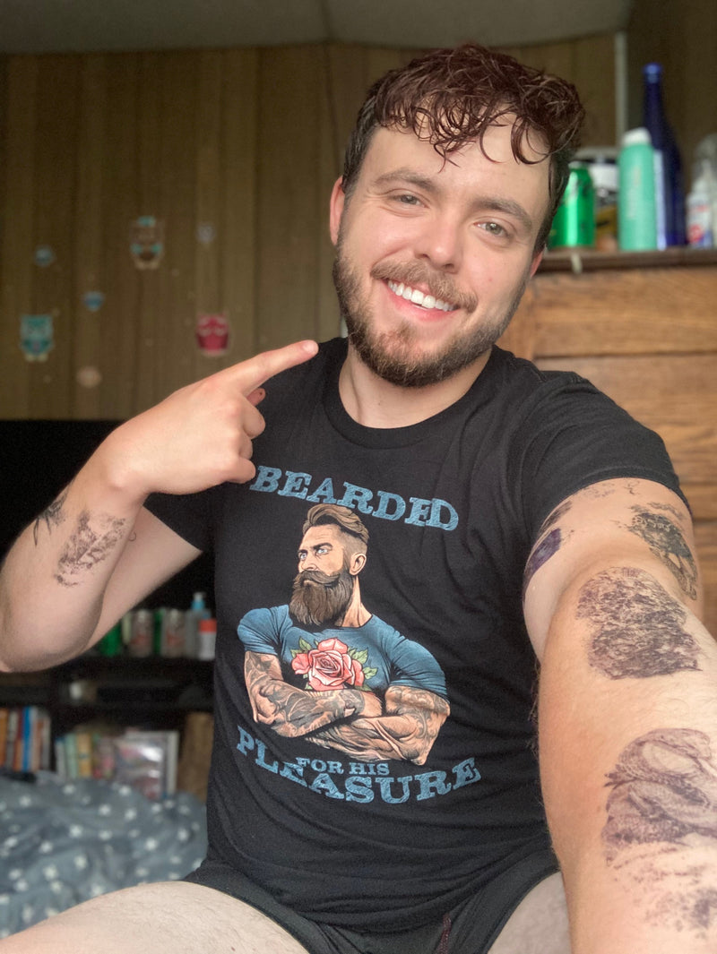 strikedaddyzach.bsky.social‬ wearing Hunky Tops
